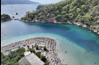 Güneşli havanın devam ettiği Fethiye ve Marmaris'te sahillerde deniz keyfi sürüyor