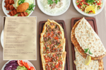 Muğla'nın Fethiye ilçesinde 1450 liraya lahmacun, 1800 TL'ye pizza satan restorana ceza yağdı