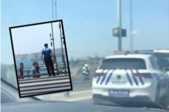 Elinde silahla köprüye çıktı, trafik durdu