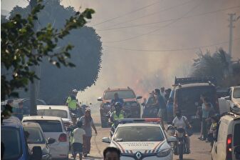 Bodrum'da makilik alanda başlayan yangın yerleşim yerlerini tehdit etti