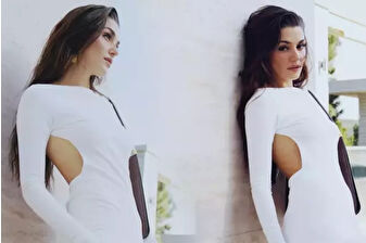 Hande Erçel'in sırt dekolteli beyaz şıklığı