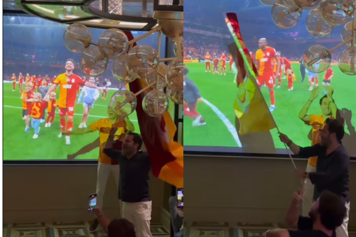 Erden Timur Galatasaray’ın Sivas’ı 4 golle devirdiği maçı Dubai’de izledi, galibiyet sevincini dev bayrakla kutladı